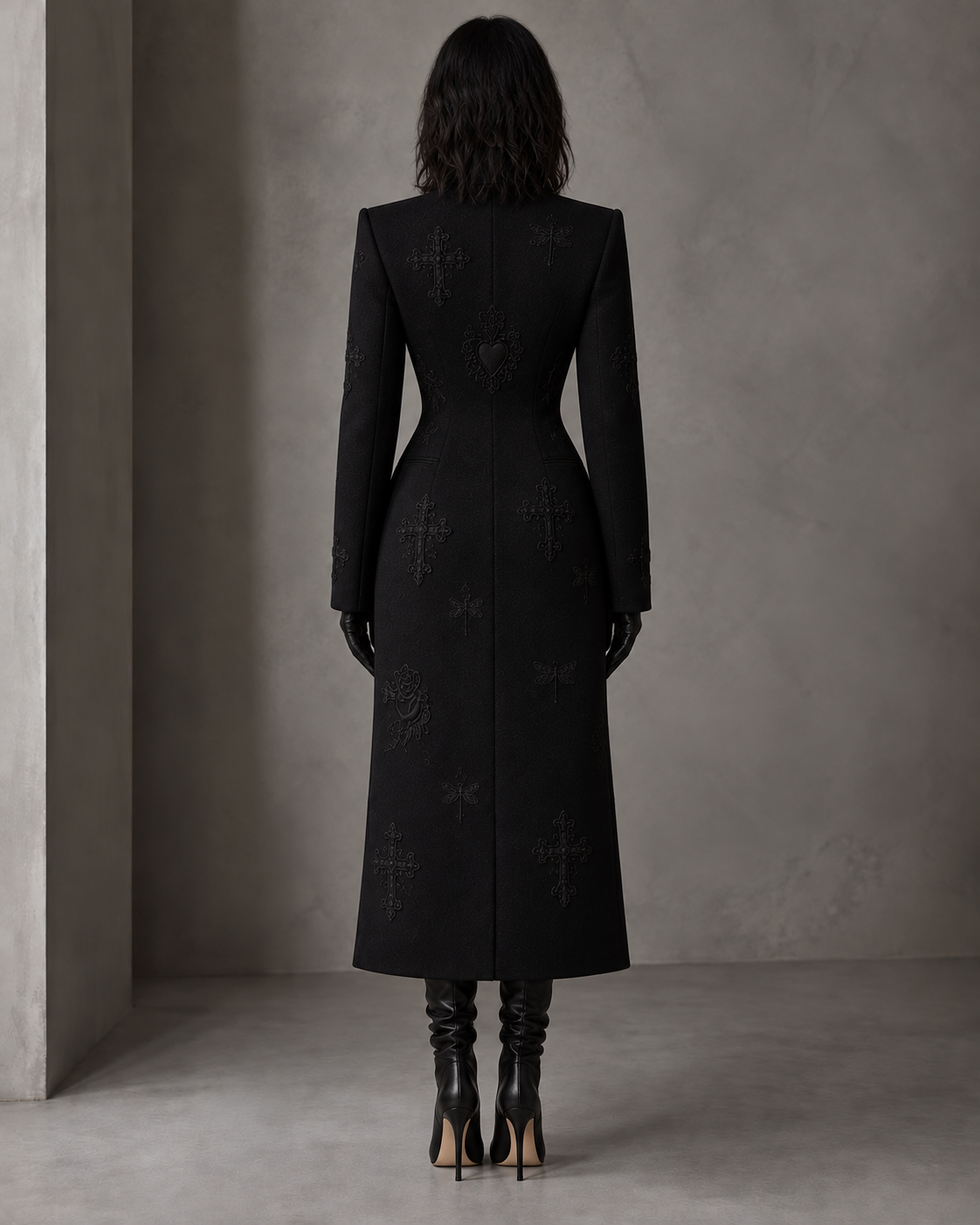 LIGNES D’OMBRE Embroidered Straight-Cut Long Coat in black, full-length editorial profile view.
