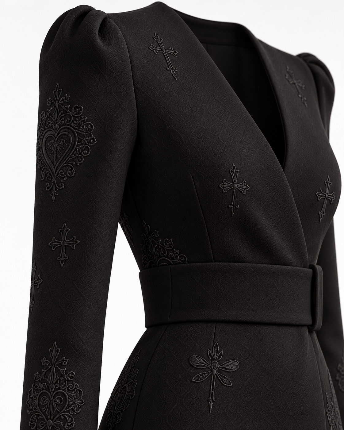 Close-up of the wide self-fabric belt and covered buckle, with tonal embroidery on the bodice, sleeve and upper skirt.