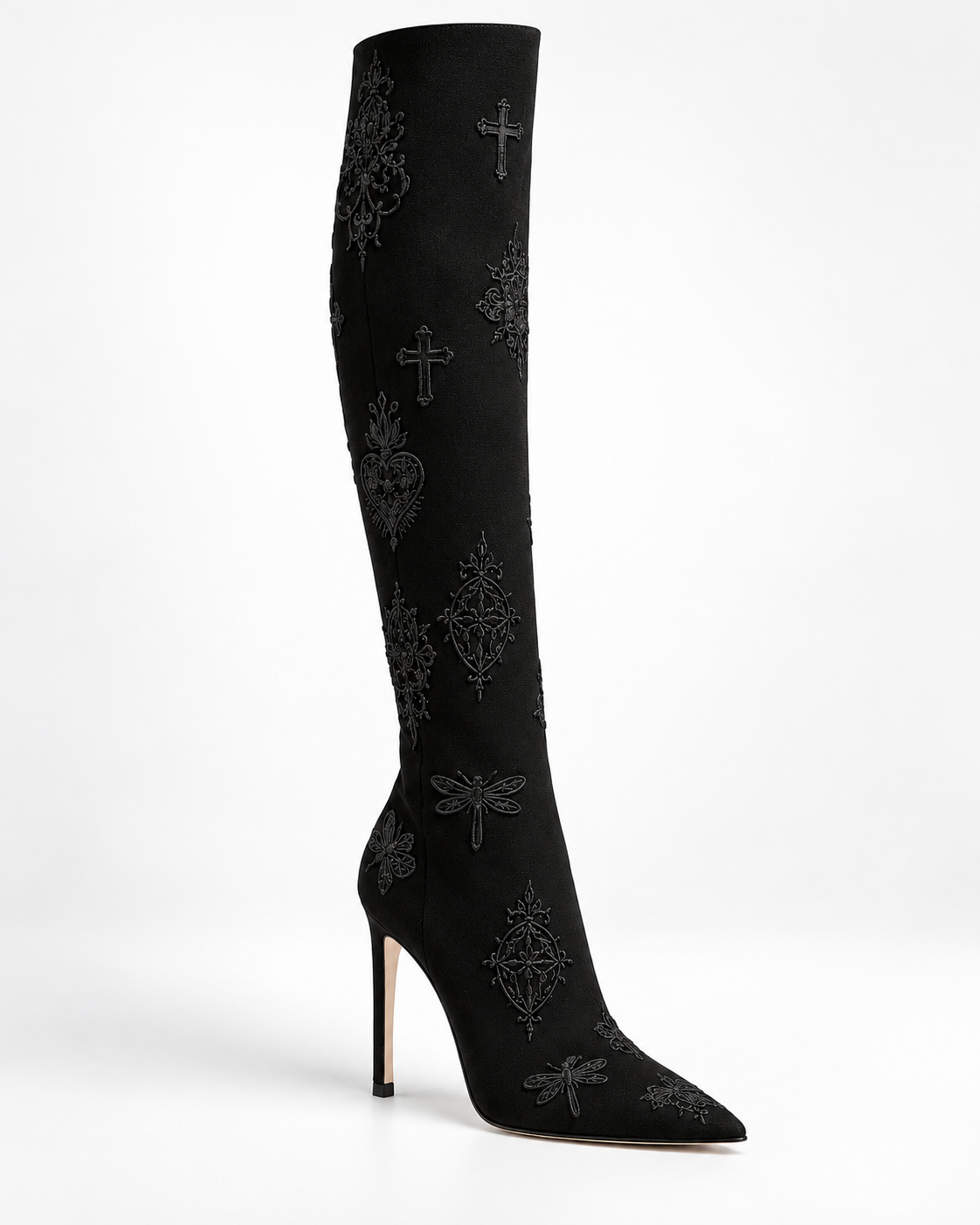 LIGNES D’OMBRE Embroidered Stiletto Tall Boots in Black. Tall shafts, pointed toes and slender stiletto heels carry tonal embroidered motifs.