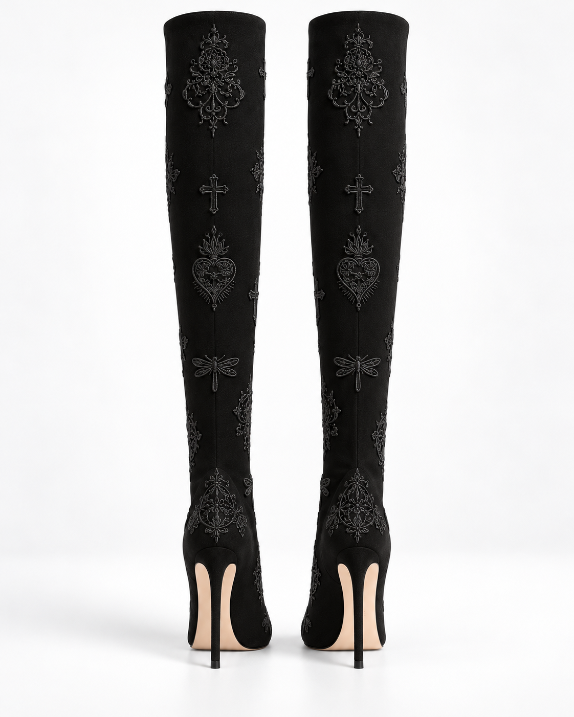 Back view of the black stiletto tall boots, showing tonal embroidery along the shafts and slender heels.