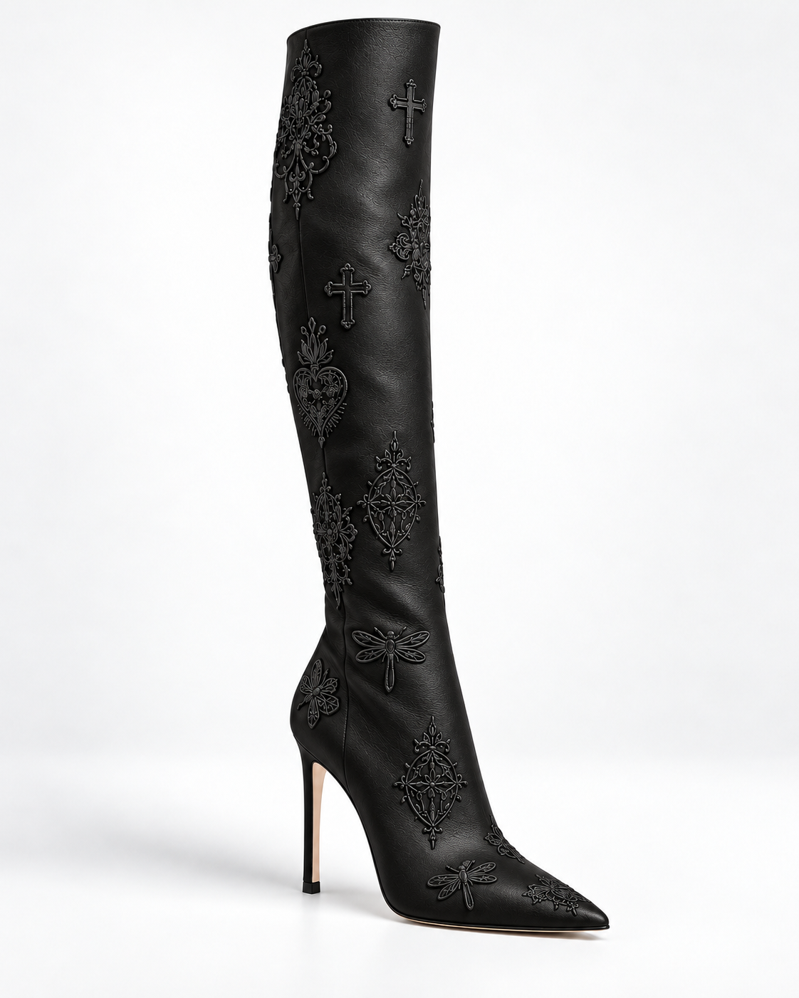 Side view of a black leather embroidered stiletto tall boot, showing its tall shaft and pointed toe.