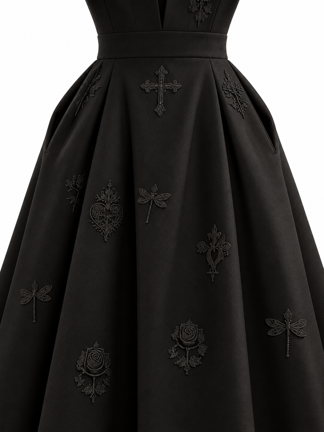 LIGNES D’OMBRE Lapel-Collar Embroidered A-Line Dress in Black, close view of the waistband, skirt pleats and tonal rose, heart and dragonfly embroidery.