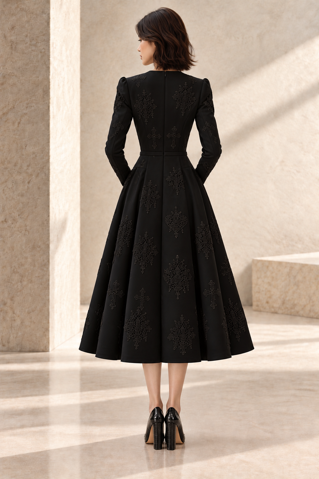 LIGNES D’OMBRE V-Neck Embroidered Full-Skirt Dress in Black, full-length back view showing the shaped bodice, long sleeves and full embroidered skirt.